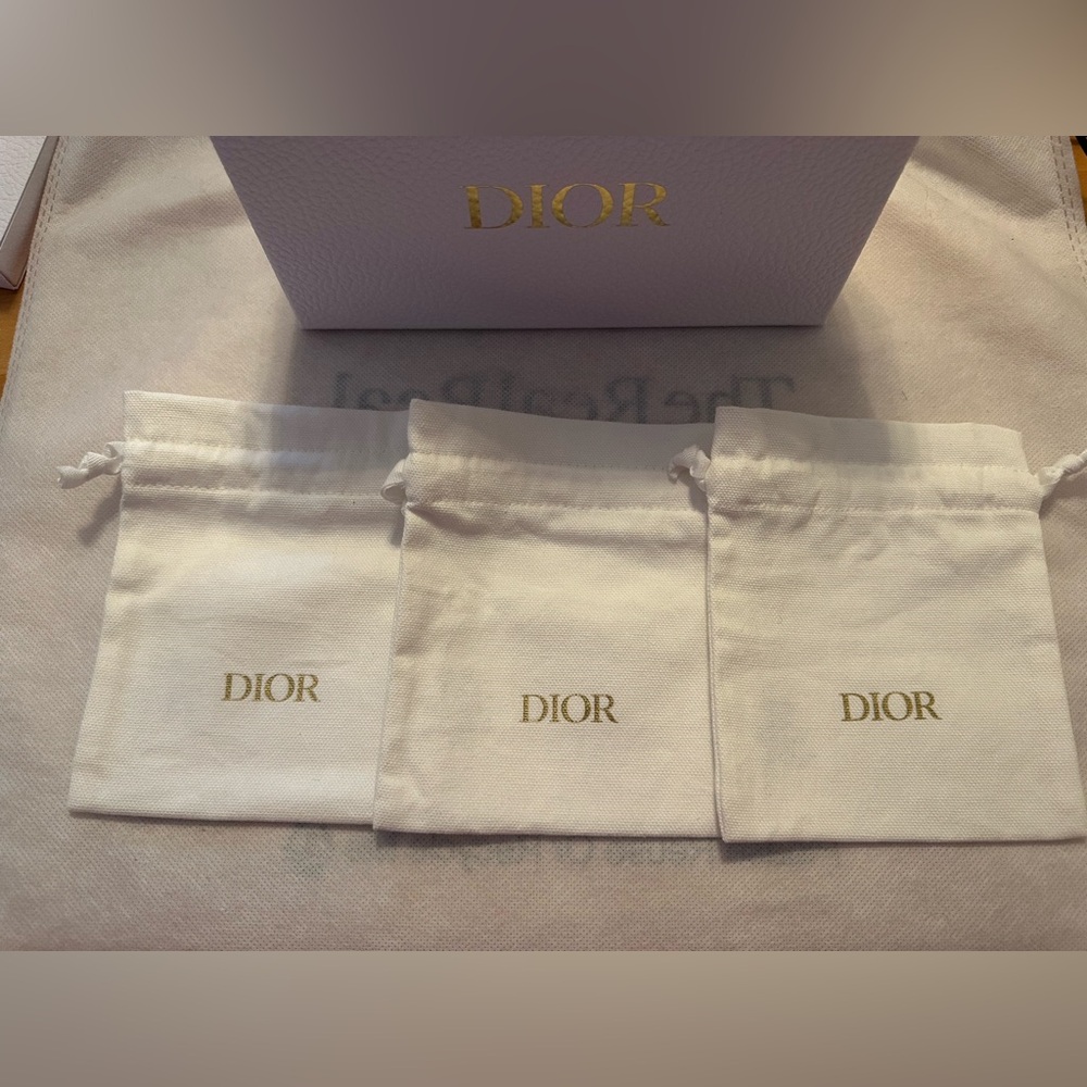 Dior Gold Logo White Pouches